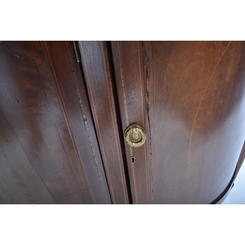 337 - A 19th century Victorian mahogany bow front sideboard / serving board. The server having cross bande... 