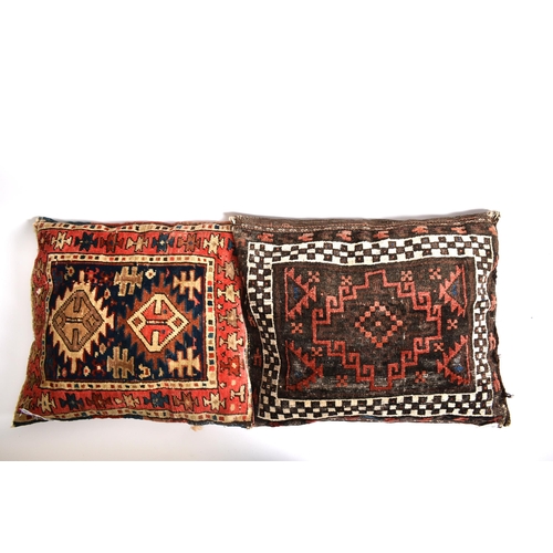 341 - A pair of early 20th century Kilim cushions. The cushion covers having been repurposed into cushions... 