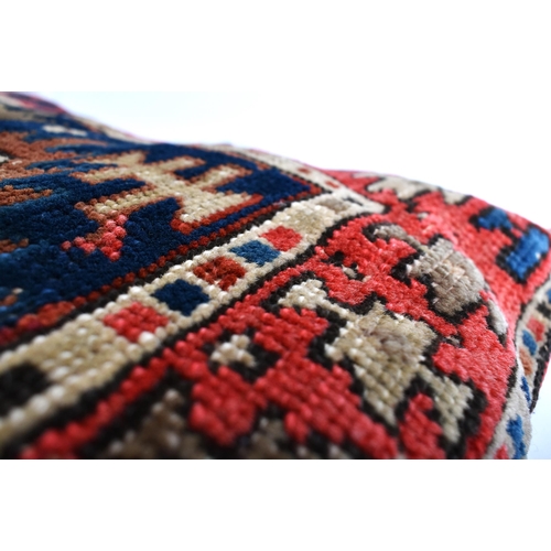 341 - A pair of early 20th century Kilim cushions. The cushion covers having been repurposed into cushions... 