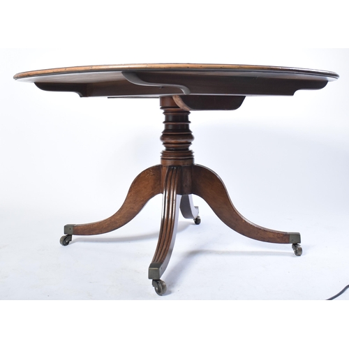 354 - A 19th century George III mahogany cross-banded breakfast table. Raised on reeded splayed legs to th... 