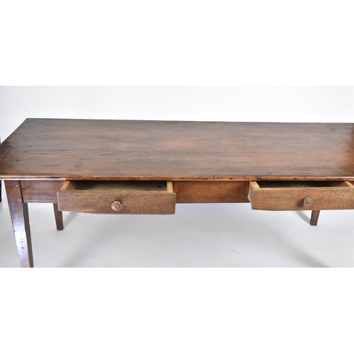 370 - A 19th century French Continental chestnut wood refectory farmhouse dining table. The table having a... 