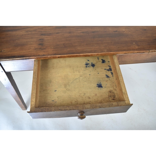 370 - A 19th century French Continental chestnut wood refectory farmhouse dining table. The table having a... 