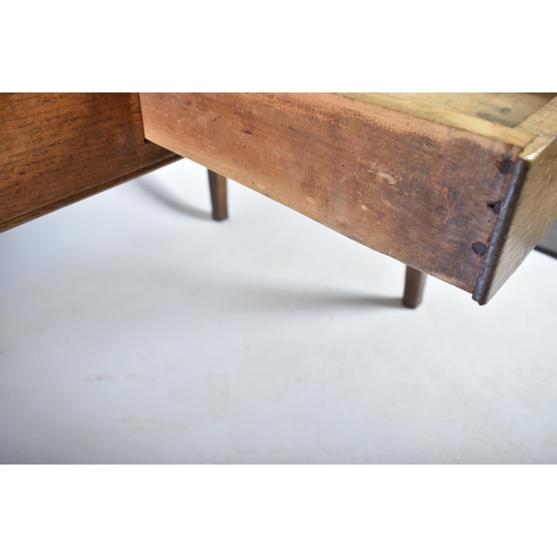 370 - A 19th century French Continental chestnut wood refectory farmhouse dining table. The table having a... 