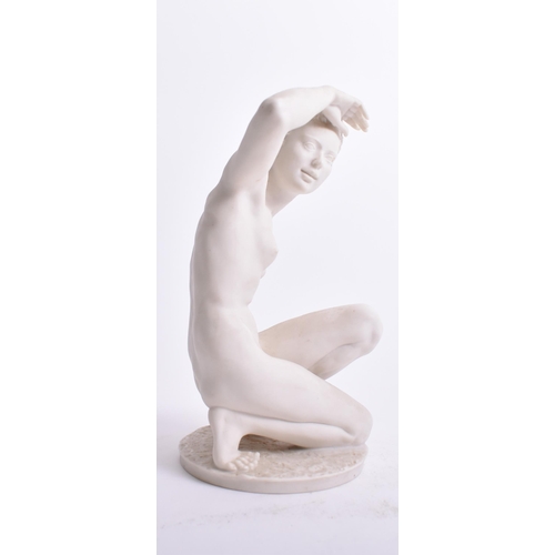 371 - Hutschenreuther - an early 20th century German bisque figurine depicting a nude lady. The woman crou... 