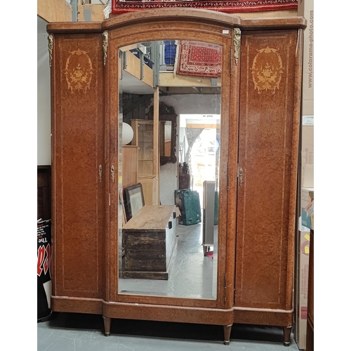 386 - A 19th century French Empire burr walnut ormolu inlaid armoire / wardrobe. The armoire having a brea... 