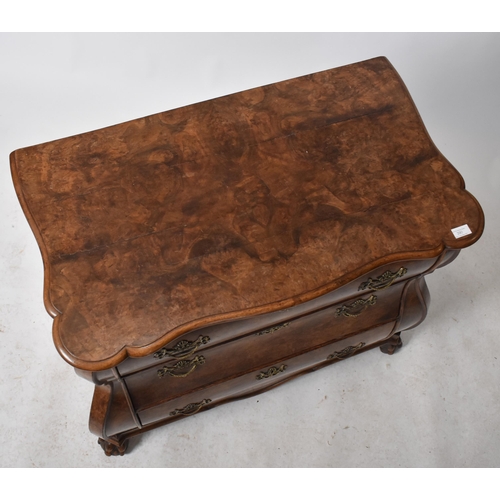 390 - A Baroque 19th century Dutch burr walnut serpentine front chest of drawers / commode. The chest havi... 