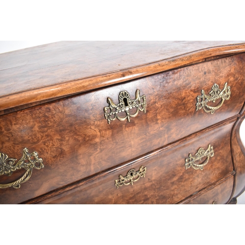 390 - A Baroque 19th century Dutch burr walnut serpentine front chest of drawers / commode. The chest havi... 