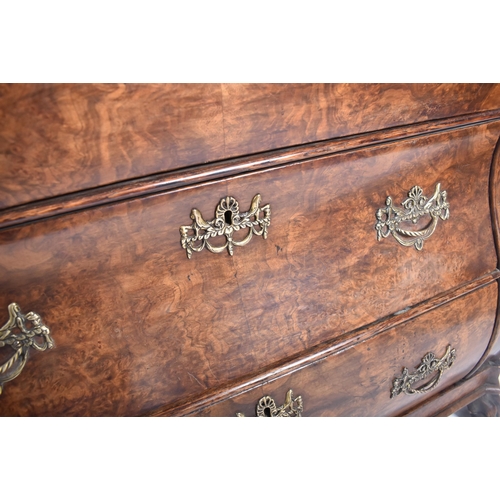 390 - A Baroque 19th century Dutch burr walnut serpentine front chest of drawers / commode. The chest havi... 