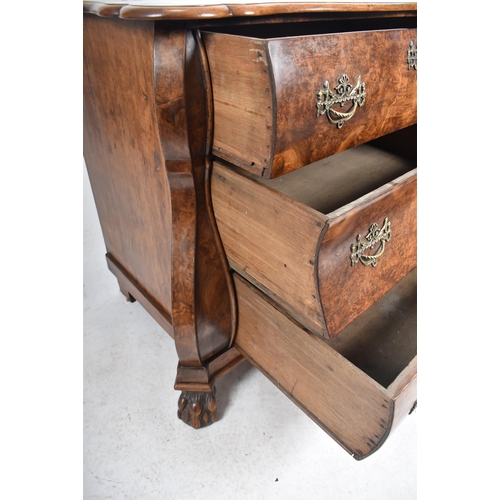 390 - A Baroque 19th century Dutch burr walnut serpentine front chest of drawers / commode. The chest havi... 