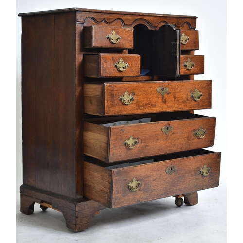 394 - A George II 18th century Scottish oak bachelor's chest of drawers. The chest having a chamfered edge... 