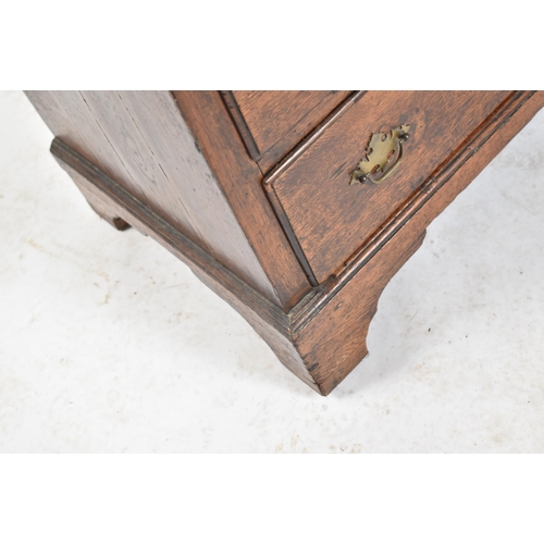 394 - A George II 18th century Scottish oak bachelor's chest of drawers. The chest having a chamfered edge... 