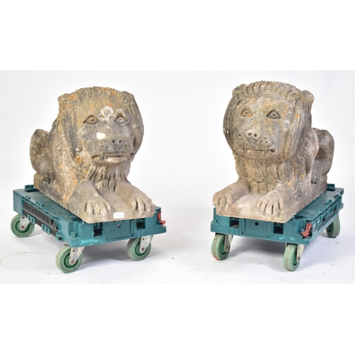 40 - A pair of 19th century white marble lions. Each lion of weathered white marble construction being se... 