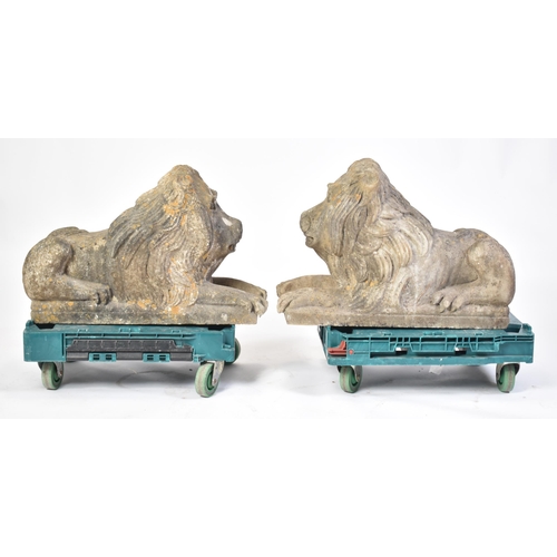 40 - A pair of 19th century white marble lions. Each lion of weathered white marble construction being se... 