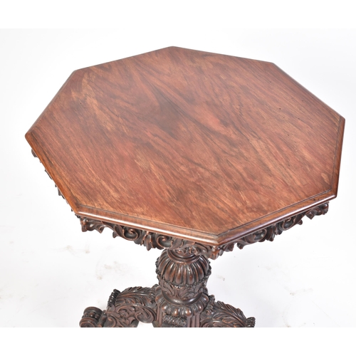 43 - A 19th century Victorian heavily carved mahogany occasional table / lamp table. The table having an ... 