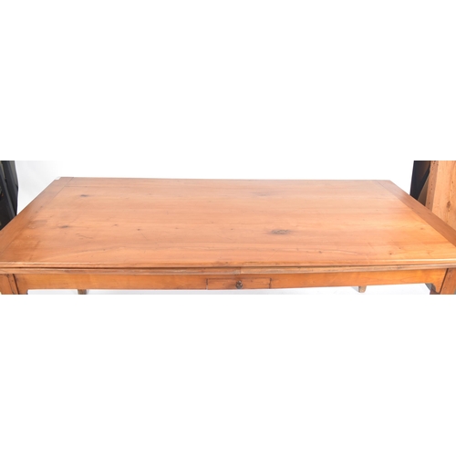 45 - An early 20th century French continental fruitwood refectory farmhouse extending dining table. The t... 