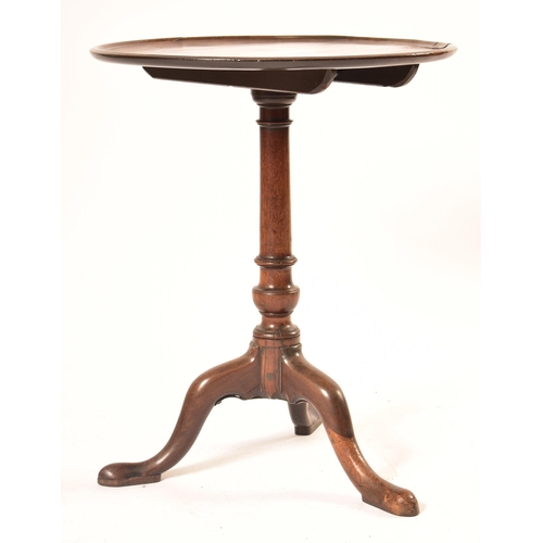 454 - A 19th century Victorian mahogany tilt top wine side table. The table top circular mounted on three ... 