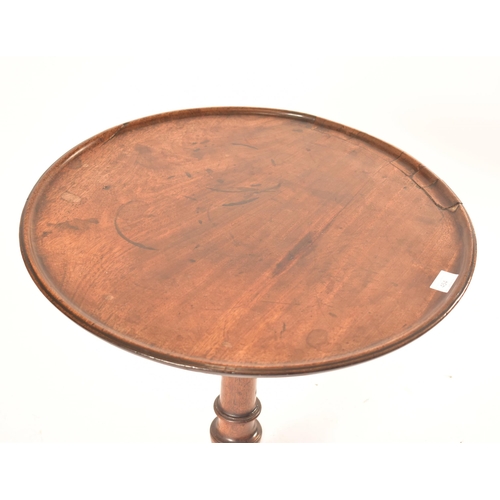 454 - A 19th century Victorian mahogany tilt top wine side table. The table top circular mounted on three ... 