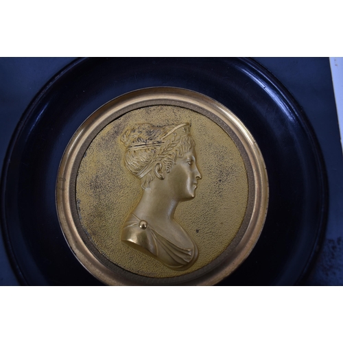 458 - A pair of early 20th century French gilt metal miniature in relief portraits of Napoleon Bonaparte &... 