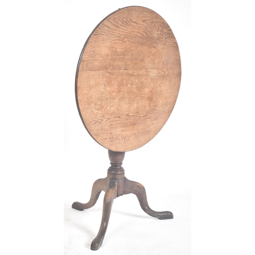 463 - A Victorian 19th century oak tilt top tripod side coffee table. The table having a circular tilt top... 