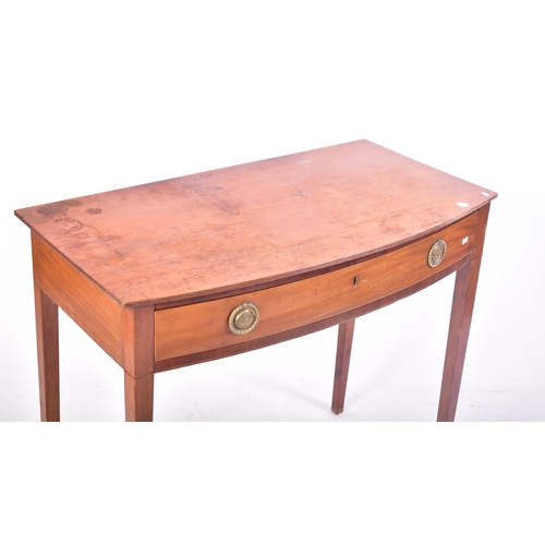 465 - A Victorian 19th century mahogany bow fronted side hall table. The table having a straight top over ... 