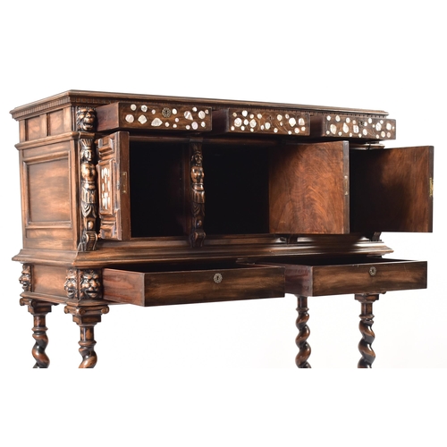 470 - A 19th century continental carved walnut cupboard on stand (fixed). The cupboard in the 17th century... 