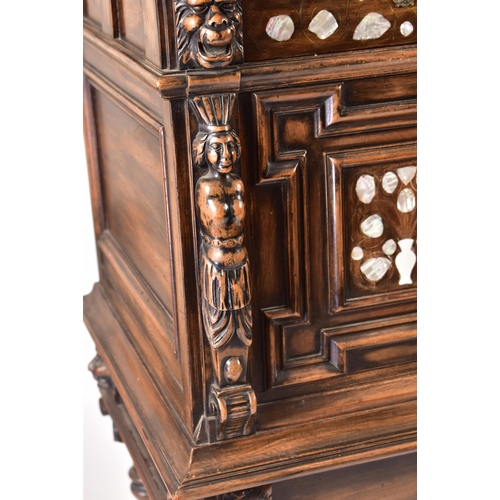 470 - A 19th century continental carved walnut cupboard on stand (fixed). The cupboard in the 17th century... 