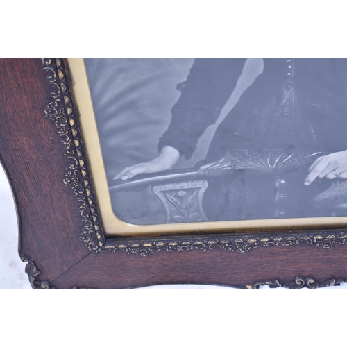 478 - A late 19th century mahogany & gilt wood frame with later replica of Victorian black & white photogr... 