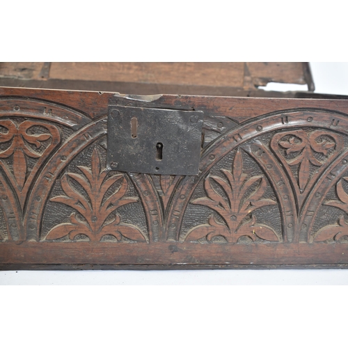 484 - A 17th carved oak bible box chest. The box being of rectangular form having a hinged fold over top t... 