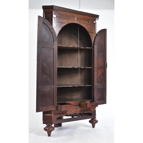 488 - A Victorian 19th century corner cupboard cabinet. The cupboard having a pediment top with dentil dec... 