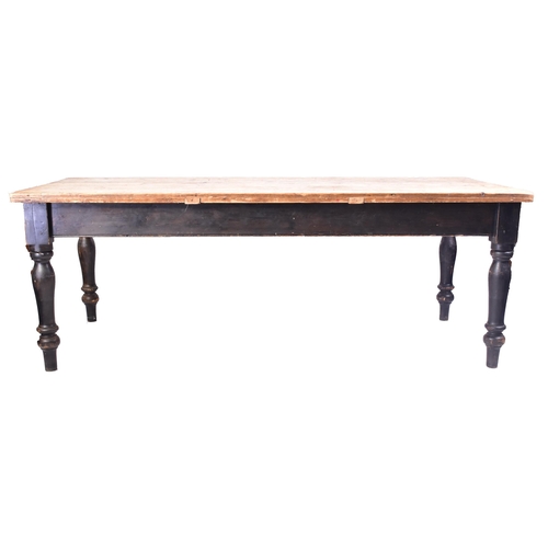 490 - A large early 20th century pine wood refectory farmhouse dining table. The table having a rectangula... 