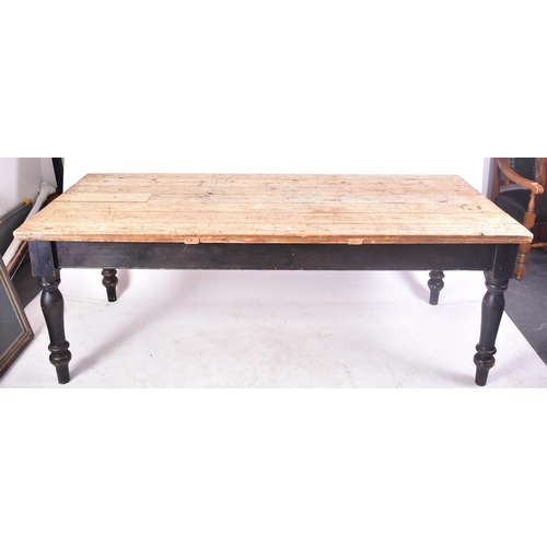 490 - A large early 20th century pine wood refectory farmhouse dining table. The table having a rectangula... 