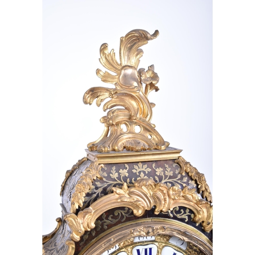 5 - A 19th century bronze mounted boulle work brass inlaid mantel clock.  The movement signed ' Adam Tho... 