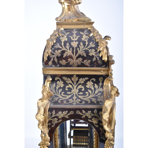 5 - A 19th century bronze mounted boulle work brass inlaid mantel clock.  The movement signed ' Adam Tho... 