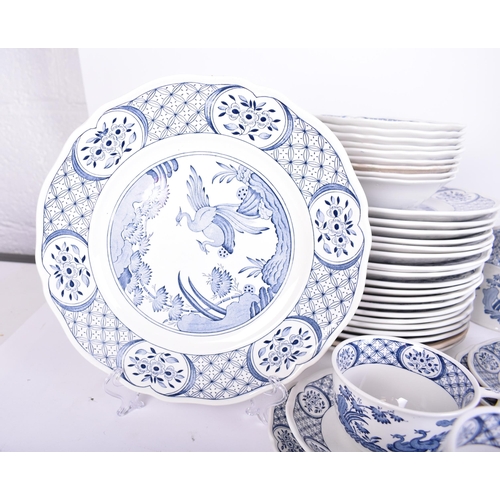 54 - A Masons ' Old Chelsea ' pattern blue and white dinner service. The service comprises dinner plates,... 