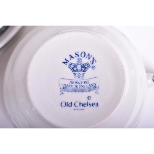 54 - A Masons ' Old Chelsea ' pattern blue and white dinner service. The service comprises dinner plates,... 