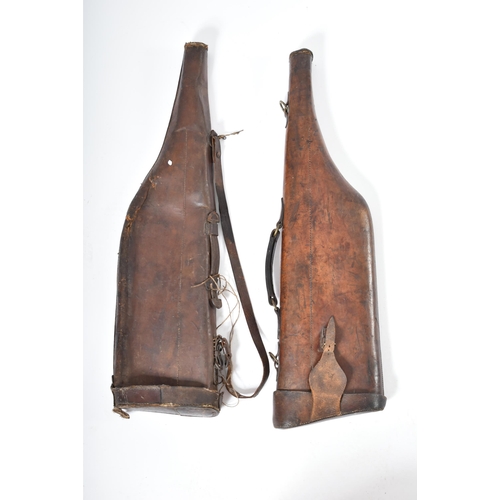 597 - Two late 19th century Victorian leather gun cases with brass fixtures. One marked to lock C. Martin.... 