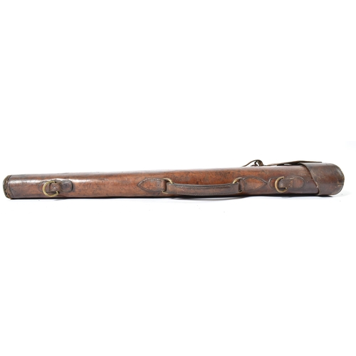 597 - Two late 19th century Victorian leather gun cases with brass fixtures. One marked to lock C. Martin.... 