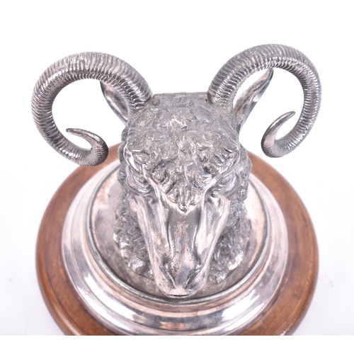 6 - A 19th century Victorian electroplated ram's head inkwell in the manner of Elkington. Raised on a ma... 