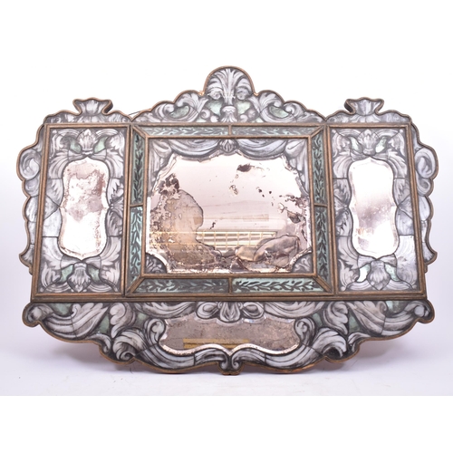 600 - A 19th century Italian hanging mirror. The mirror having an arched pediment top with painted glass f... 