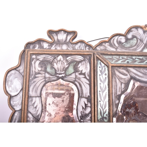 600 - A 19th century Italian hanging mirror. The mirror having an arched pediment top with painted glass f... 