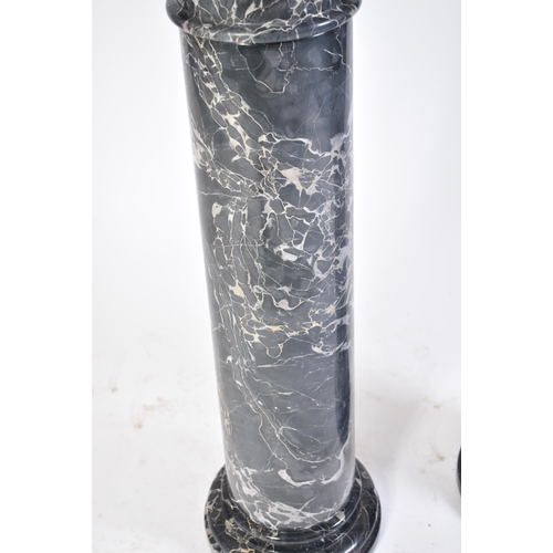 66 - A pair of large freestanding grey and white veined marble pedestals. Each with large heavy polished ... 