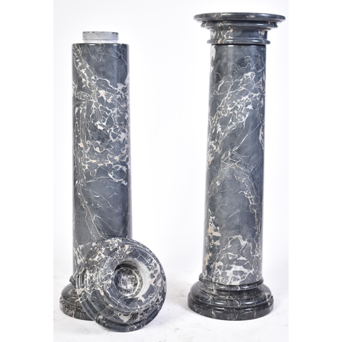 66 - A pair of large freestanding grey and white veined marble pedestals. Each with large heavy polished ... 