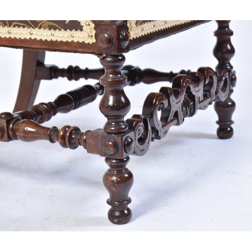 68 - A 19th century Victorian carved mahogany throne chair / armchair. Heavily carved top rail flanked by... 