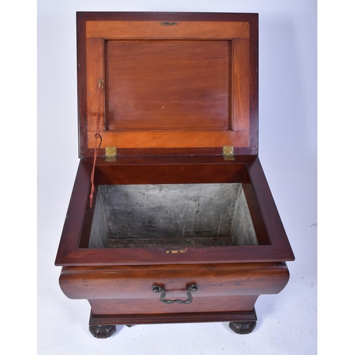 72 - A 19th century William IV large mahogany wine cooler of sarcophagus shape. The cooler with a clean, ... 