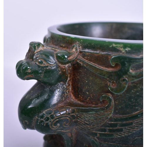 76 - A large Chinese Oriental Archaic style early 20th century spinach green colour glass hand carved bru... 