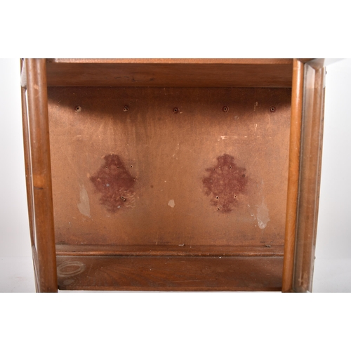 87 - A 19th century American oak stick and ball hanging display cabinet. The cabinet with stick and ball ... 