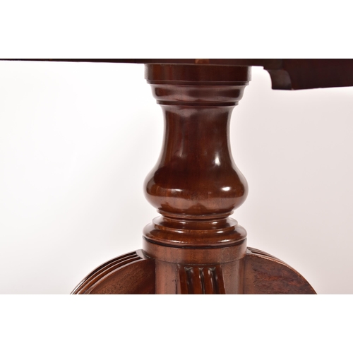 9 - A late 18th century George III solid mahogany tilt top breakfast table. Raised on reeded splayed leg... 