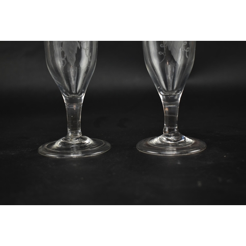 91 - A pair of 18th century plain stem ale glasses. Each glass engraved with hop flower and barley ears r... 