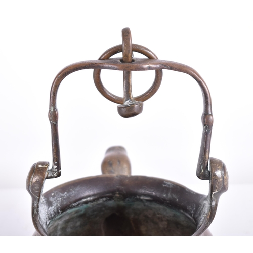 94 - A late 17th century French continental hand cast bronze scoop water basin pot. The basin with zoomor... 