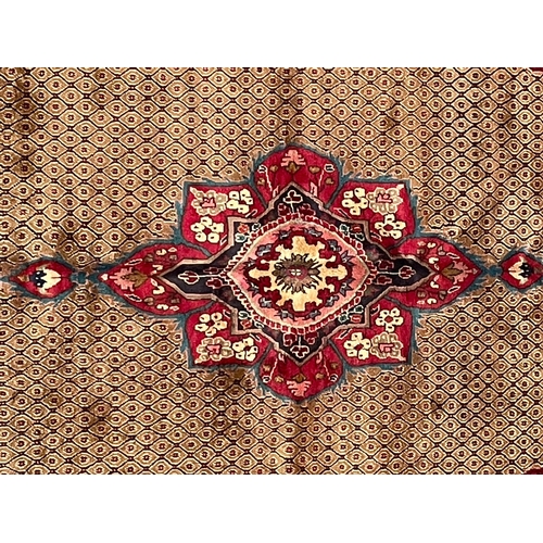 58 - An early 20th century North East Persian Islamic Kurdie floor carpet rug. The rug having a central f... 